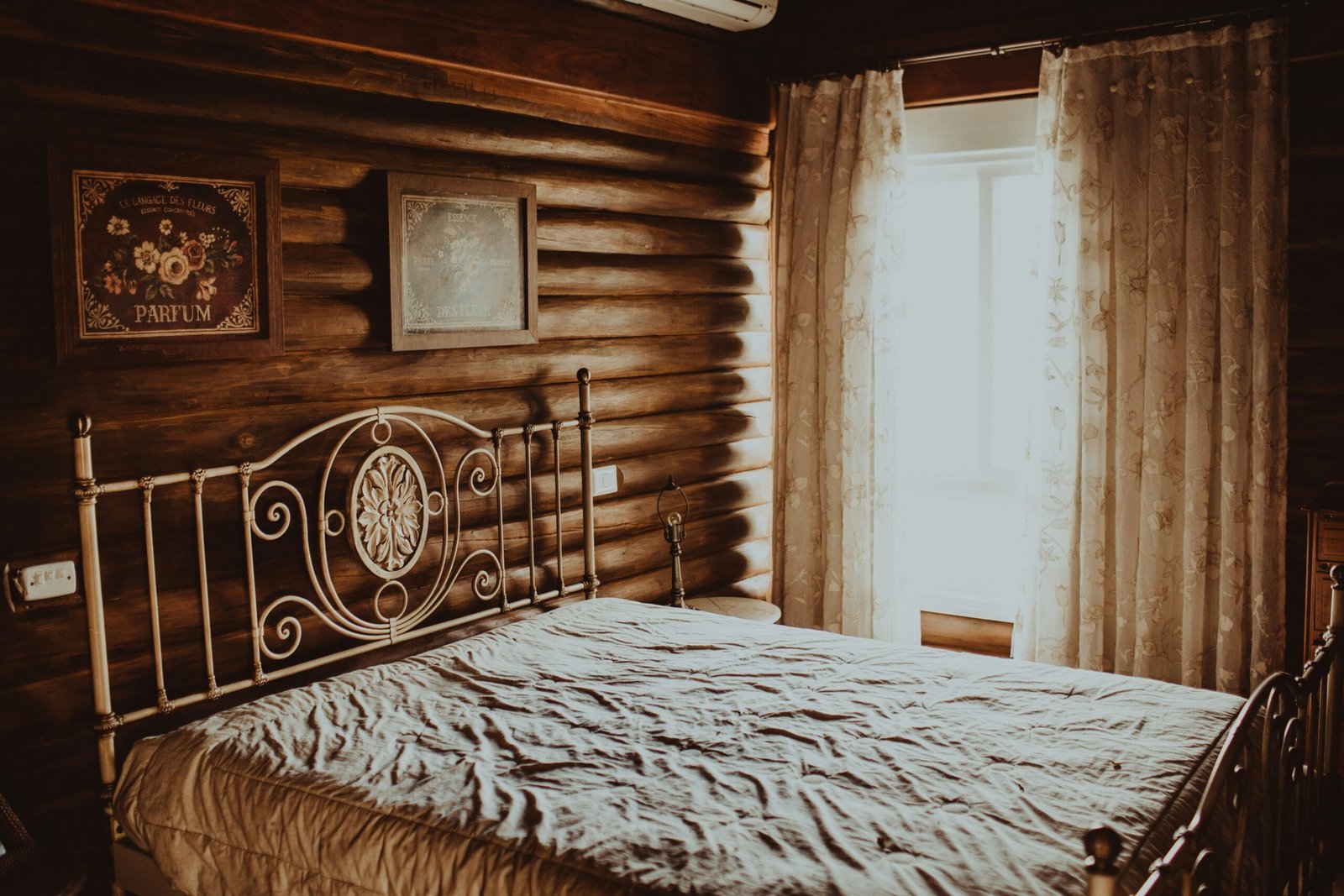 Cozy wood panel bedroom with modern rustic vibes.
